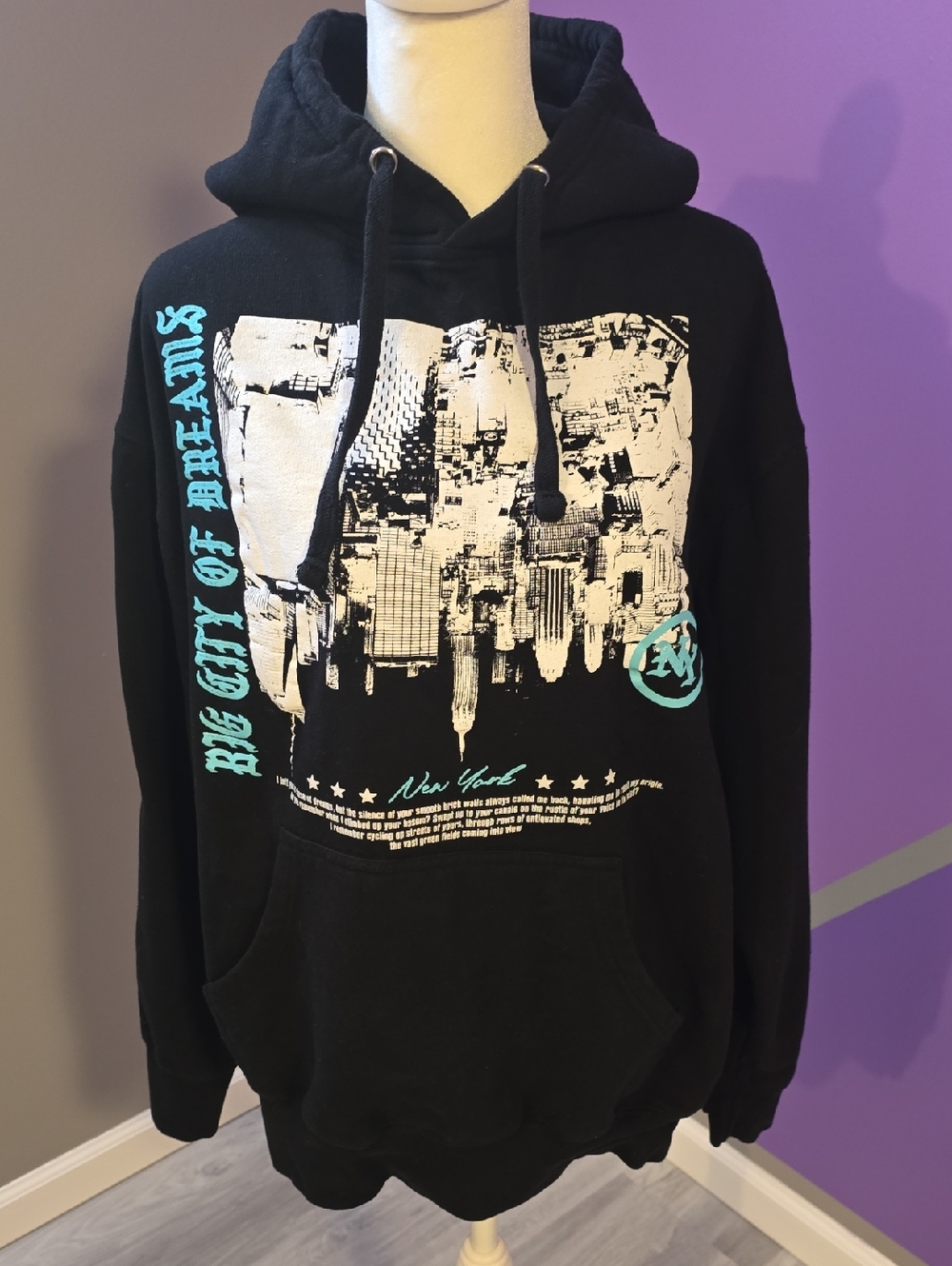 Fashion Nova Black Hoodie with White City Graphic and Teal Accents